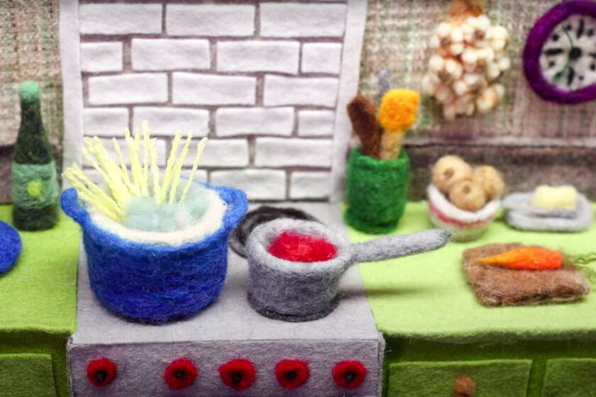 LOS ANGELES, CA., APRIL 22, 2020: Screenshot from a colorful stop motion video of cooking pasta with sauce made from wool, Andrea Love's YouTube channel (Andrea Love/YouTube)