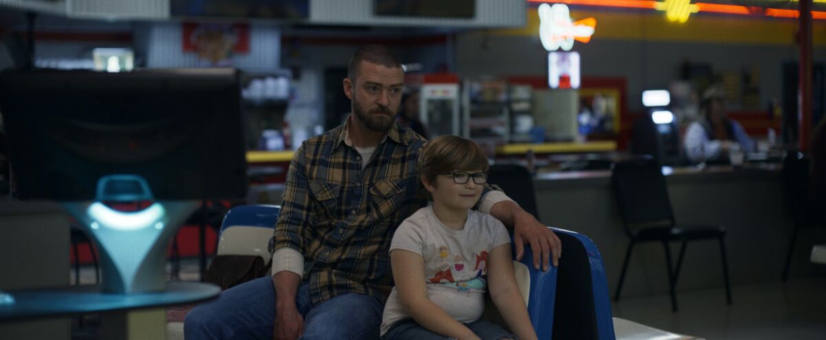 Justin Timberlake and Ryder Allen in the movie "Palmer."