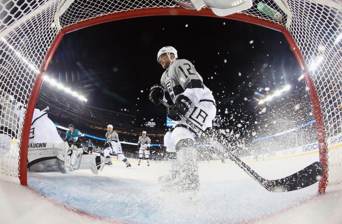 Kings forward Marian Gaborik sprays ice into the goal during the Stadium Series matchup with the Sharks.