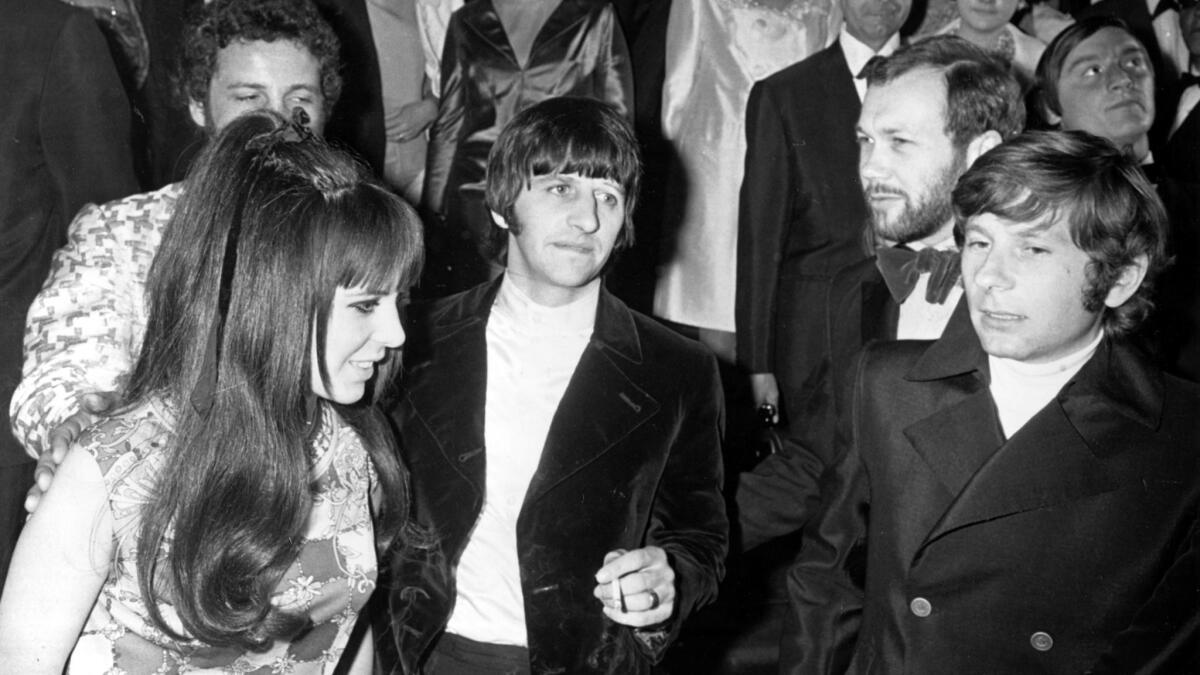 Director Roman Polanski, far right, with Beatles drummer Ringo Starr, center, and his wife, Maureen, right, at Cannes on May 15, 1968.