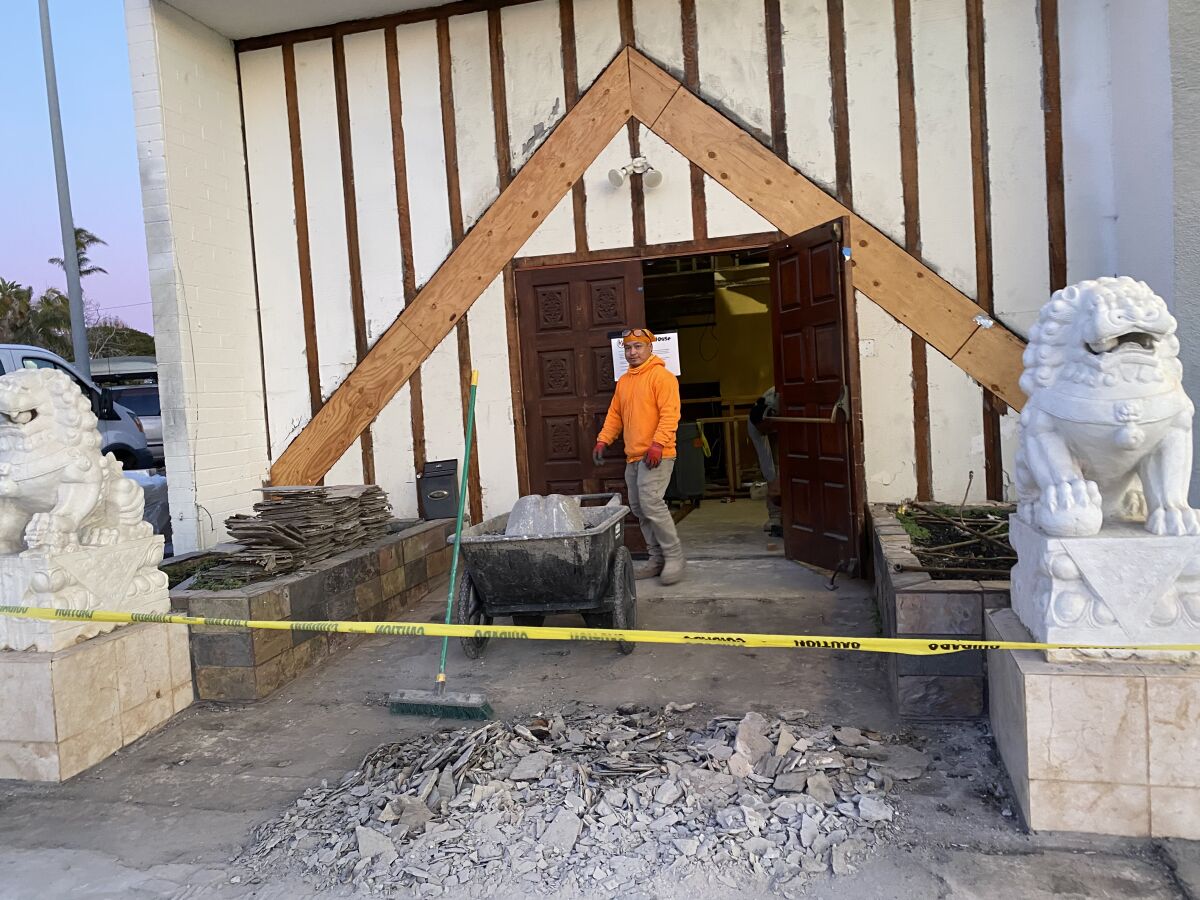Workers slowly bring the Mandarin House back to life at 6765 La Jolla Blvd.