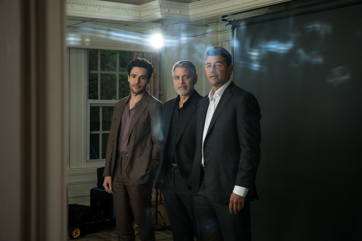 From left, Chris Abbott, George Clooney and Kyle Chandler.