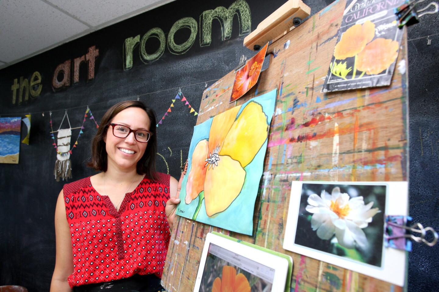 The Art Room owner Jenna Macho of Burbank, at her studio in La Crescenta on Wednesday, July 13, 2016. Macho has owned the studio for more than eight years. The lesson this day was about cool and warm colors, in the Georgia O'Keeffe style.