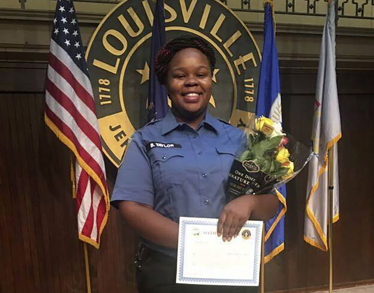 This undated photo provided by Taylor family attorney Sam Aguiar shows Breonna Taylor in Louisville, Ky. Three months after plainclothes detectives serving a warrant busted into Tylor's apartment on March 13, 2020, and shot the 26-year-old Black woman to death, only one of the three officers who opened fire has lost his job. Calls for action against the officers have gotten louder during a national reckoning over racism and police brutality following George Floyd's death in Minneapolis. (Photo provided by Taylor family attorney Sam Aguiar via AP)