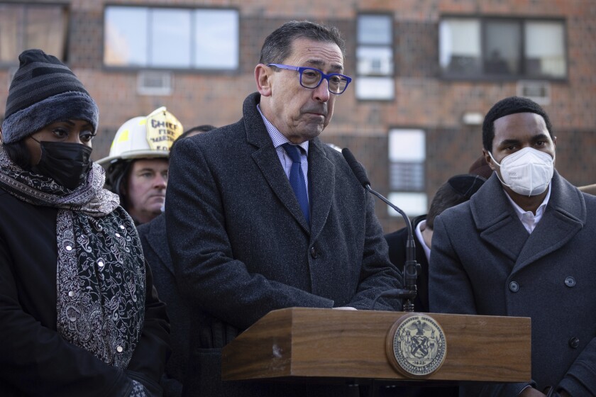 FDNY commissioner Daniel A. Nigro speaks during a news conference outside the apartment building which suffered the city's deadliest fire in three decades, in the Bronx borough of New York on Monday, Jan. 10, 2022. Nigro said Friday that he will retire next month after more than seven years in the job and a career spanning more than five decades and stints in every rank in the department. (AP Photo/Yuki Iwamura)