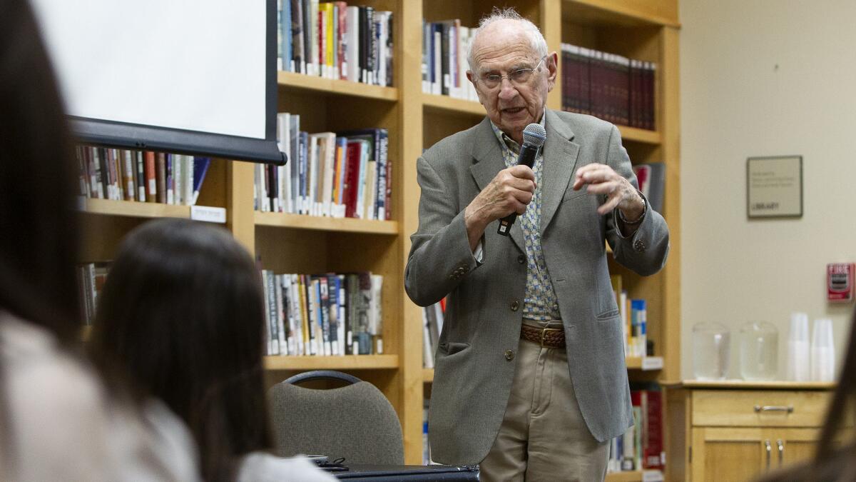 Holocaust survivor Jack Pariser speaks to Sage Hill School students from teacher Kate Ball’s modern world history class during Holocaust Remembrance Day on Thursday at the Merage Jewish Community Center of Orange County in Irvine.