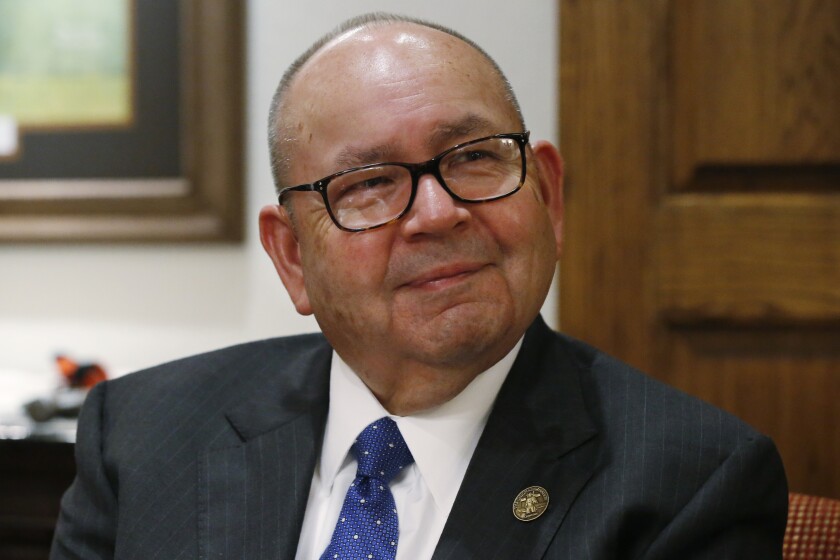 FILE - In this Sept. 17, 2019 file photo, Bill Anoatubby, Governor of the Chickasaw Nation, is pictured during an interview in his office in Ada, Okla. Two of the most powerful Native American tribes in Oklahoma said Monday, May 10, 2021 they've reached an agreement on federal legislation that would address concerns over criminal jurisdiction in light of a recent U.S. Supreme Court decision. (AP Photo/Sue Ogrocki File)