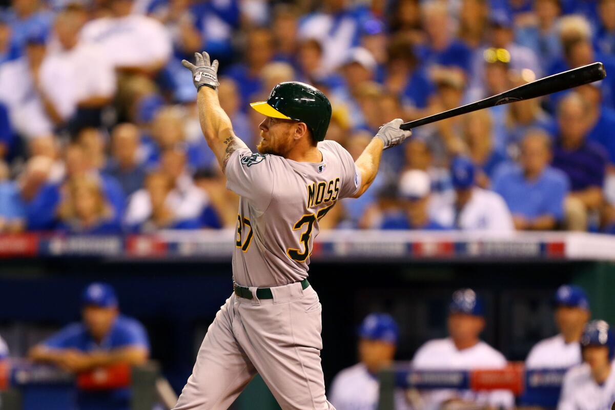 Oakland's Brandon Moss hits a two-run home run against the Kansas City Royals during the American League wild card game on Sept. 30.