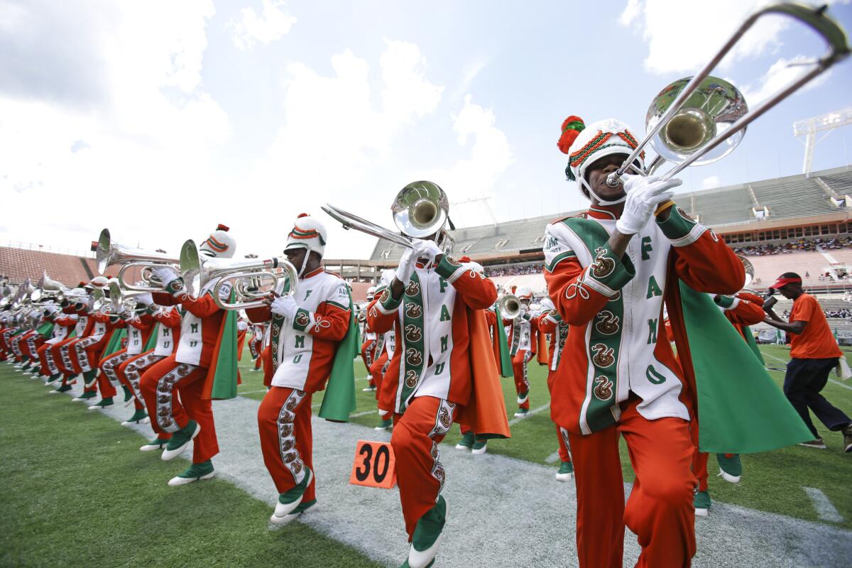 The Florida A&M University band performs Sept. 1, 2013, in Orlando during FAMU's season-opening football game against Mississippi Valley State, its first appearance in a football stadium in nearly 22 months after the 2011 hazing death of drum major Robert Champion.