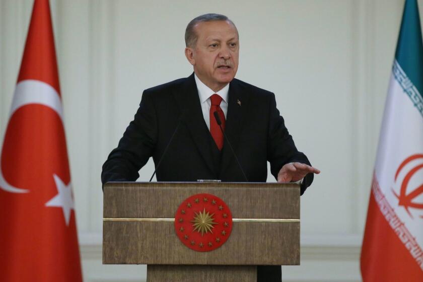 This handout picture released by the Turkish Presidential press service shows Turkey's President Recep Tayyip Erdogan delivering a speech during Turkey-Iran Business Forum at Cankaya Palace in Ankara, Turkey on December 20, 2018. - Erdogan held talks with Rouhani with Syria likely to dominate the agenda after the surprise US decision to withdraw. The meeting in Ankara had been arranged before US President stunned allies and American officials the day before with an order to pull ground forces from the war-ravaged nation. (Photo by MURAT CETIN MUHURDAR / TURKISH PRESIDENTIAL PRESS SERVICE / AFP) / RESTRICTED TO EDITORIAL USE - MANDATORY CREDIT "AFP PHOTO /TURKISH PRESIDENTIAL PRESS OFFICE " - NO MARKETING NO ADVERTISING CAMPAIGNS - DISTRIBUTED AS A SERVICE TO CLIENTSMURAT CETIN MUHURDAR/AFP/Getty Images ** OUTS - ELSENT, FPG, CM - OUTS * NM, PH, VA if sourced by CT, LA or MoD **