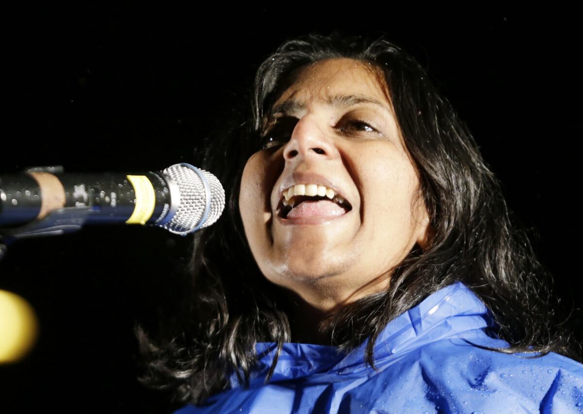 The Socialist member-elect of the Seattle City Council speaks at rally in support of machinists union members who voted last week to reject contract concessions that Boeing said it needed to build the new 777X airliner in Washington state.