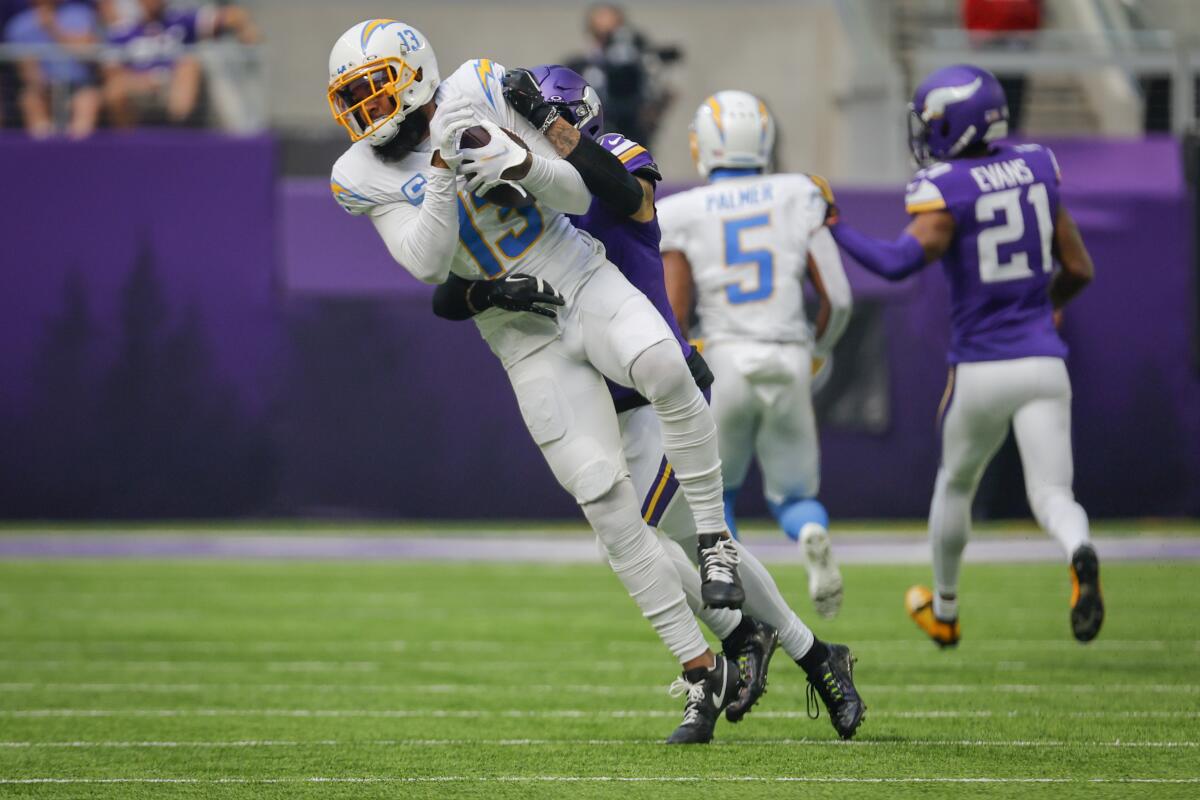 Chargers receiver Keenan Allen (13) catches a pass against the Minnesota Vikings.