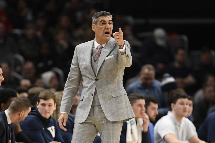 FILE - Villanova head coach Jay Wright gestures during the first half of an NCAA college basketball game against Georgetown in Washington, in this Saturday, March 7, 2020, file photo. Villanova coach Jay Wright was set to return to practice Tuesday following his bout with COVID-19. Those plans are on hold after two players tested positive Monday, Jan. 4, 2021, and the Wildcats were forced to postpone their next three games. (AP Photo/Nick Wass, File)