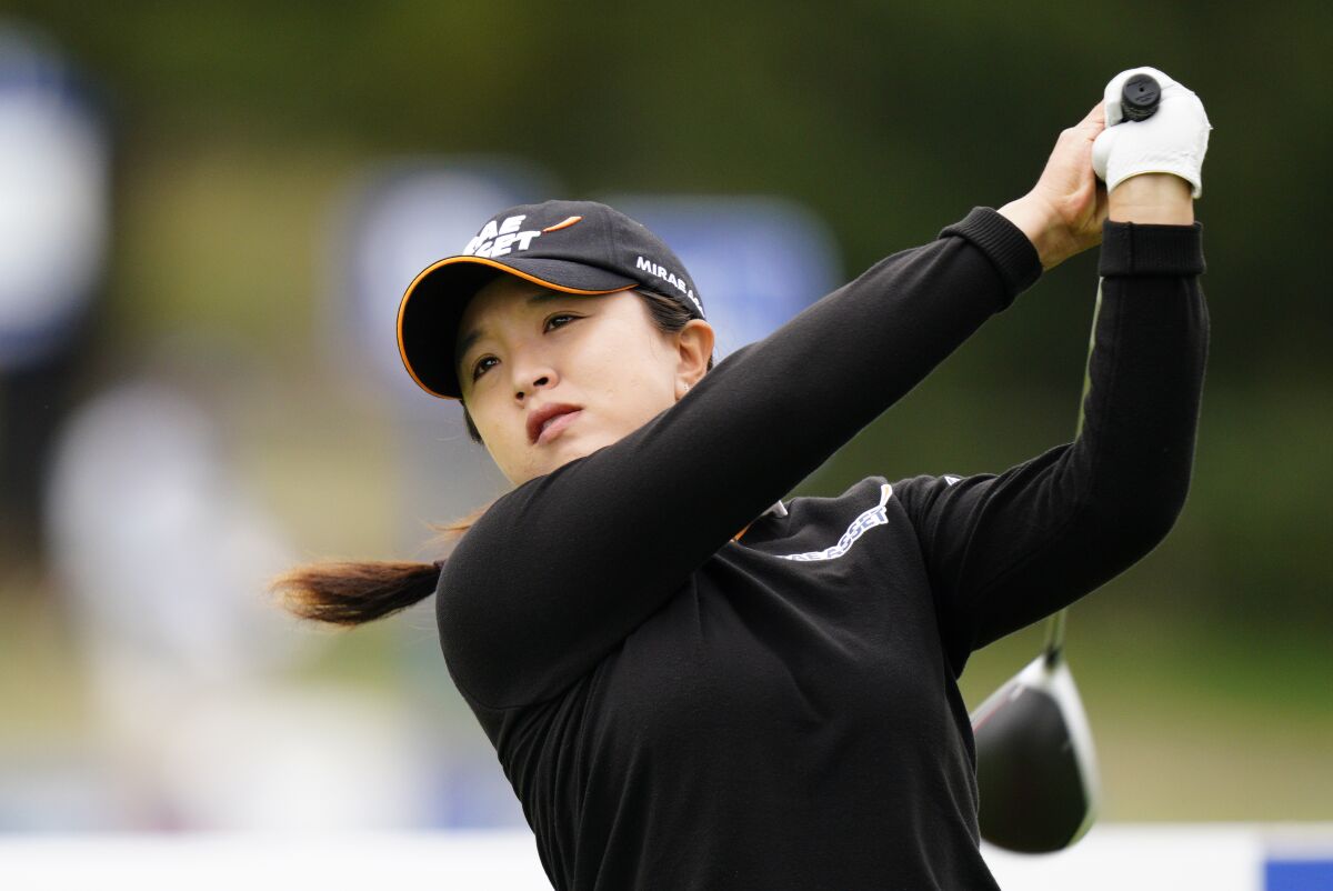 Sei Young Kim, of South Korea, watches her tee shot on the 12th hole during the final round at the KPMG Women's PGA Championship golf tournament at the Aronimink Golf Club, Sunday, Oct. 11, 2020, in Newtown Square, Pa. (AP Photo/Chris Szagola)