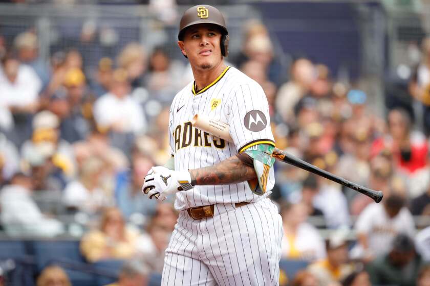 San Diego, CA - May 15: San Diego Padres designated hitter Manny Machado (13) walks back to the dugout after striking out against the Colorado Rockies during the seventh inning at Petco Park on Wednesday, May 15, 2024 in San Diego, CA. (Meg McLaughlin / The San Diego Union-Tribune)
