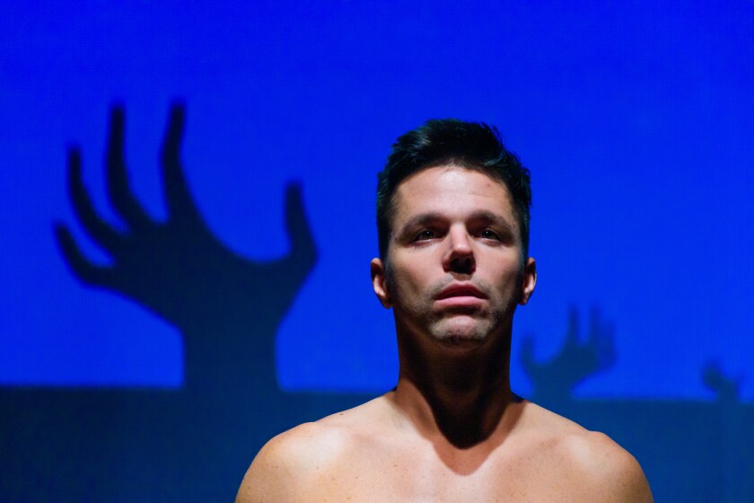 John Logan in City Garage's premiere of Jeton Neziraj's Orwellian play "Department of Dreams."
