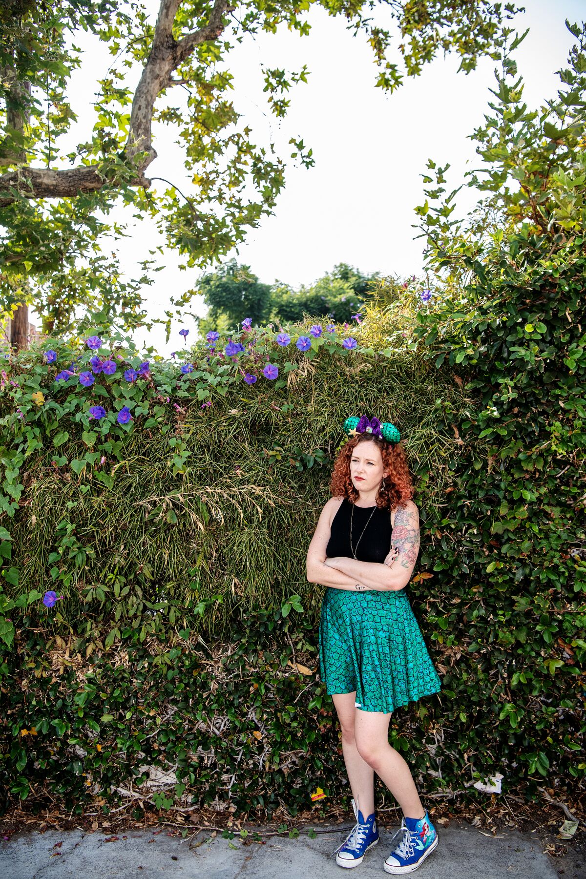 Dressed in Ariel-inspired attire, Stacey Major is feeling the loss of visiting Disneyland.