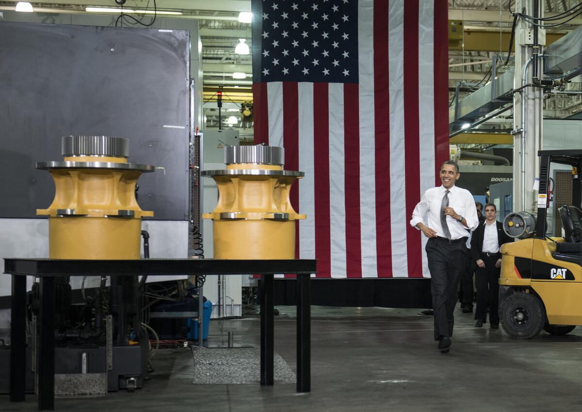 President Obama arrives to speak at the Linamar factory in Asheville, N.C.