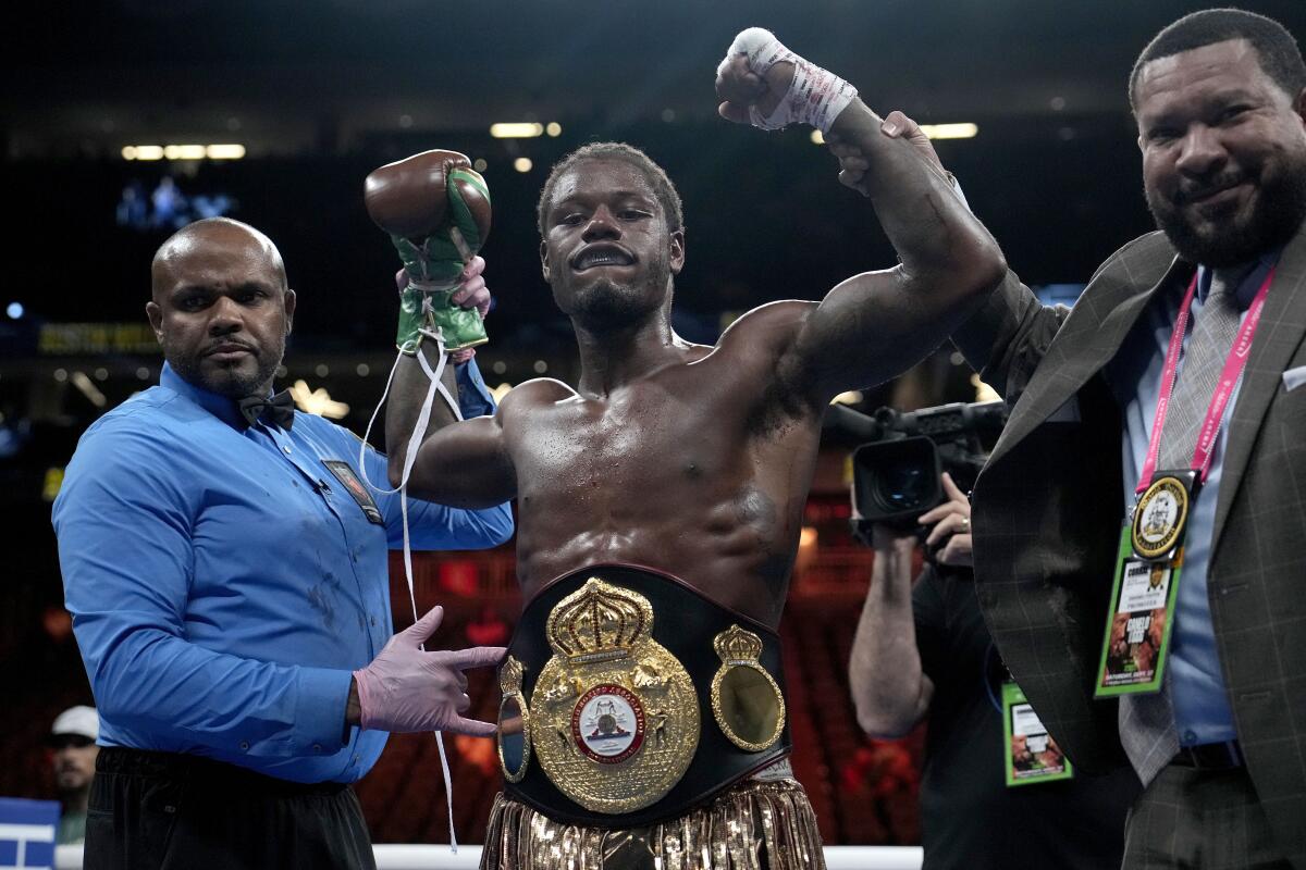 Austin Williams celebrates his middleweight boxing match win over Kieron Conway Saturday in Las Vegas. 