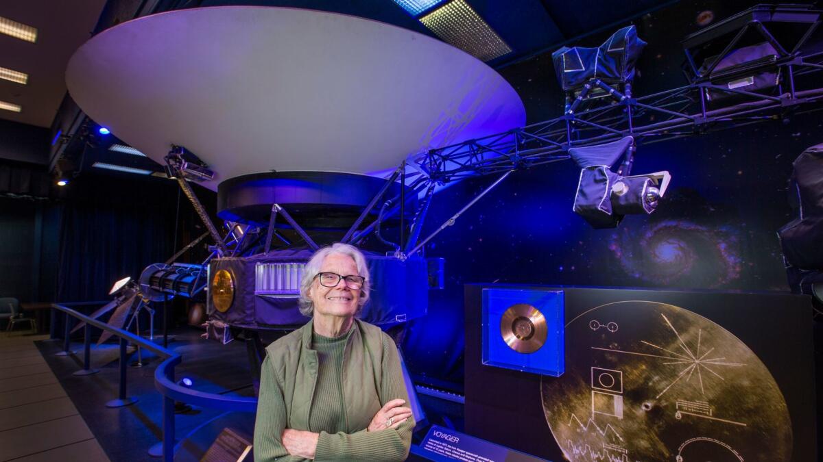 Finley, 80, shown next to a model of the Voyager 1 space probe. She worked on Voyager in the 1970s. (Allen J. Schaben / Los Angeles Times)