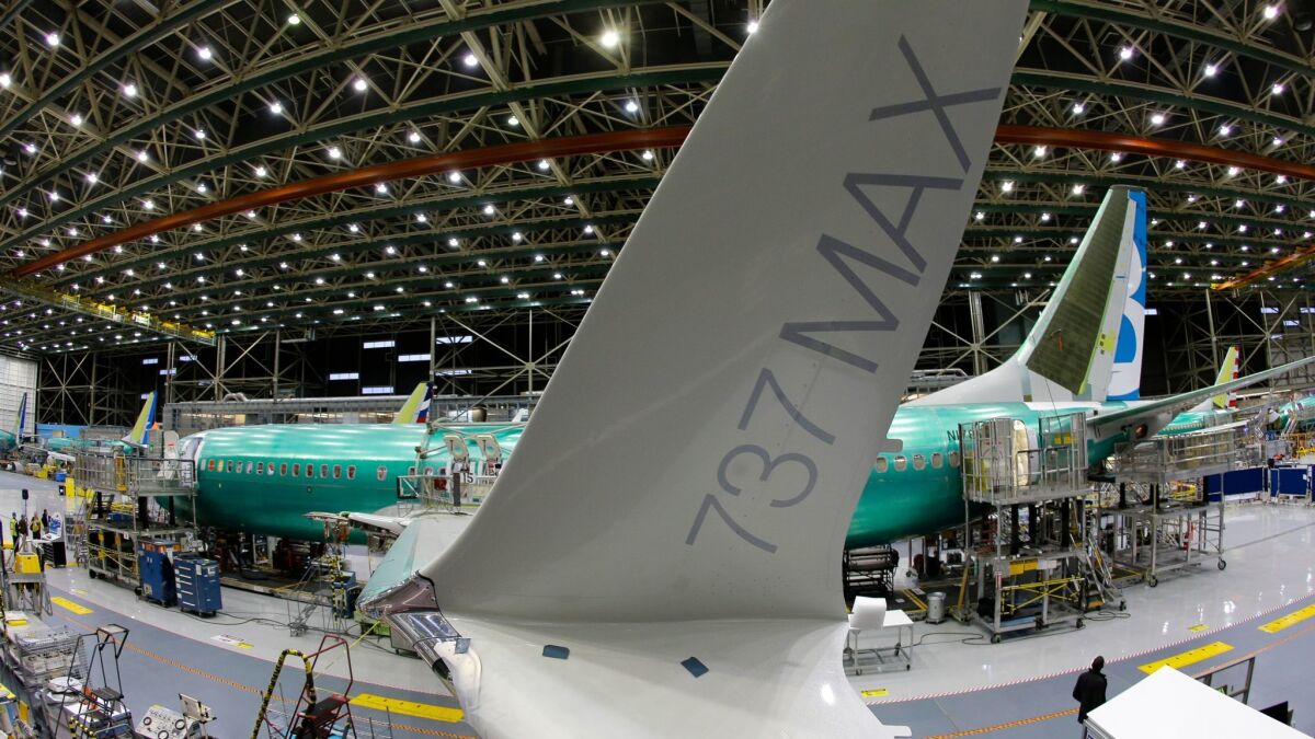 A Boeing 737 MAX airplane being built on the assembly line in Renton, Wash. American Airlines has changed its mind about reducing legroom on three rows of seats.