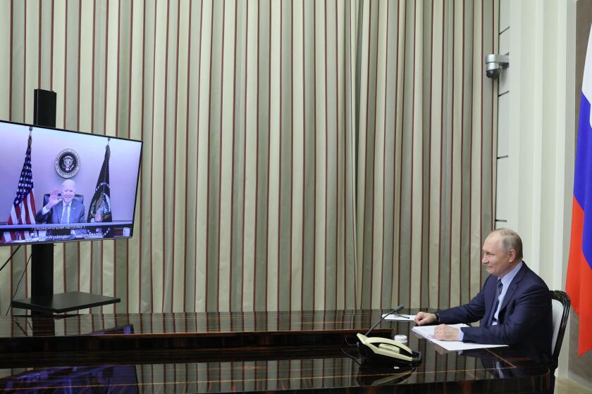 Russian President Vladimir Putin attends a meeting with US President Joe Biden via a video call in the Black Sea resort of Sochi on December 7, 2021. (Photo by Mikhail METZEL / SPUTNIK / AFP) (Photo by MIKHAIL METZEL/SPUTNIK/AFP via Getty Images)