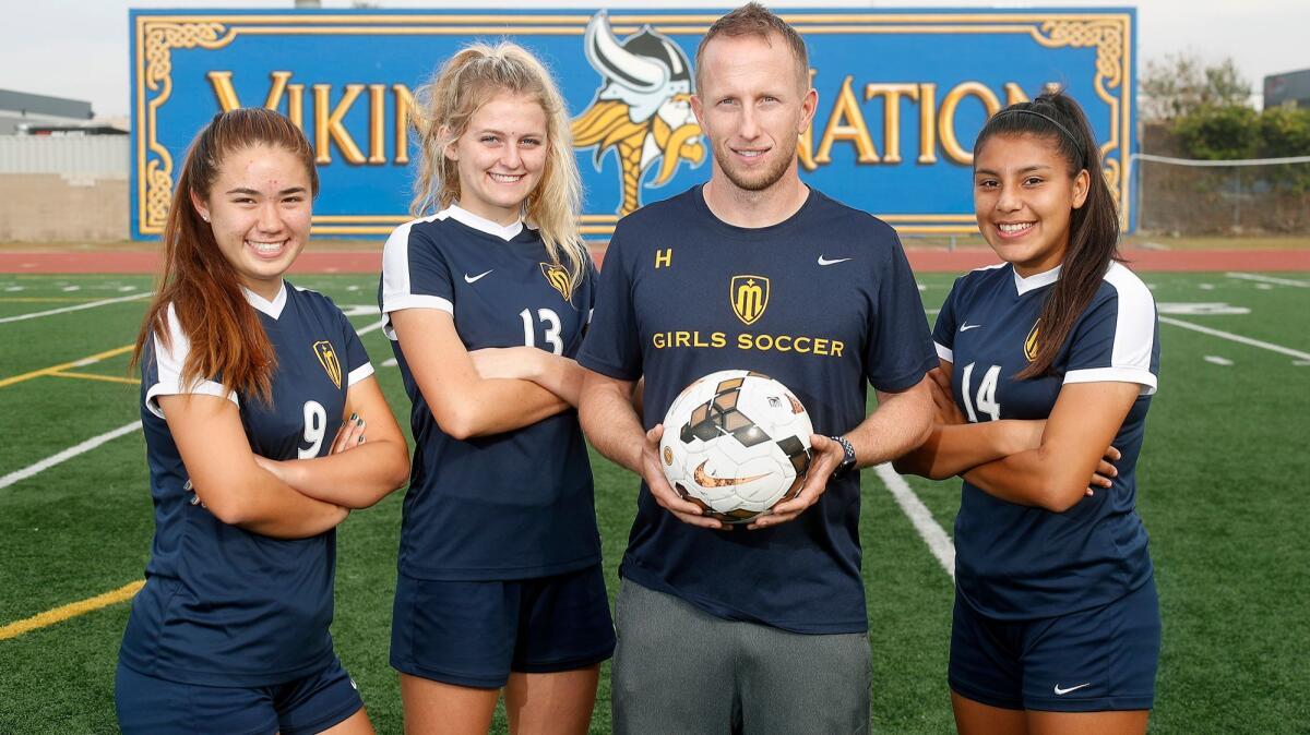 Marina High girls' soccer first-year coach Heath Oberle has three captains in junior Kellie Hallworth (9), and seniors Autumn Stewart (13) and Erika Sosa (14).