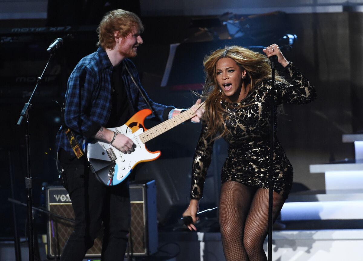 Ed Sheeran and Beyonce perform Tuesday night during "Songs in the Key of Life: An All-Star Grammy Salute," a tribute to Stevie Wonder, at the Nokia Theatre.