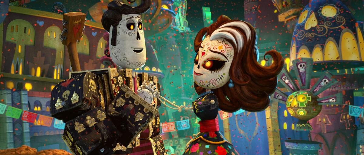 Characters Manolo, voiced by Diego Luna, left, and Carmen Sanchez, voiced by Ana de la Reguera in a scene from "The Book of Life."