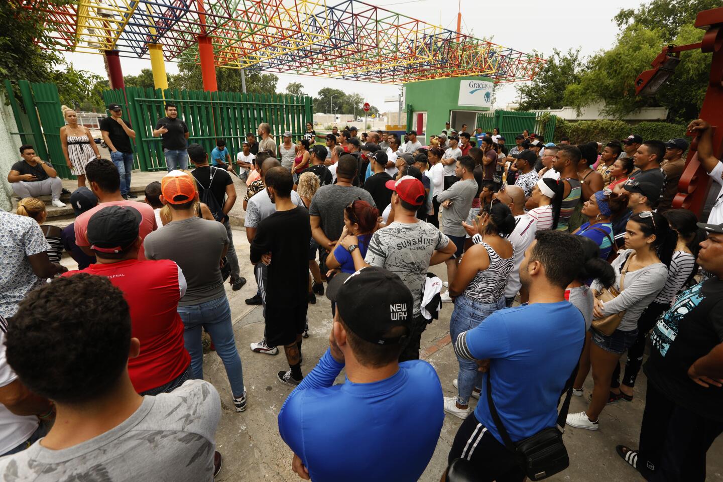 ACUNIA, MEXICO--Over 400 Cubans are camping in a park on the Mexico-U.S. border in Acunia, Mexico. There is a wait list, with over 500 names on it, but only three or four get called each day to cross the bridge to Del Rio to apply for asylum. Some have been waiting months and the camp may be closed soon and those waiting moved to some other location in Acunia, Mexico. (Carolyn Cole/Los Angeles Times)