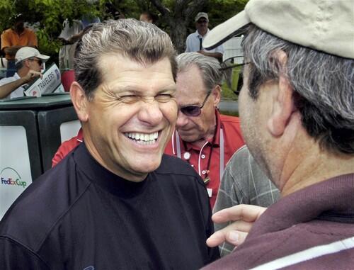 UConn women's Hall of Fame basketball coach Geno Auriemma chats with reporters prior to teeing off from the first tee during the Travelers Championship Celebrity Pro-Am on Wednesday.