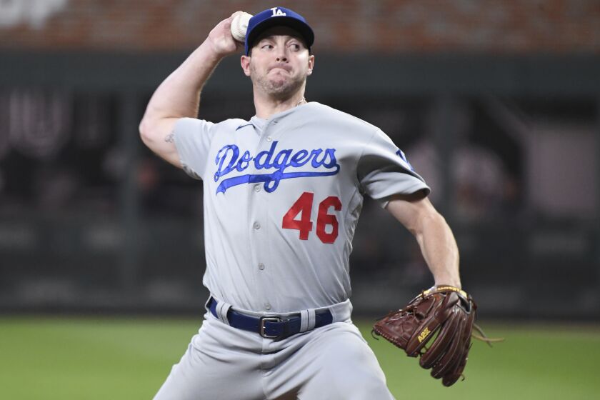 Atlanta, GA - October 16: Los Angeles Dodgers starting pitcher Corey Knebel delivers a pitch during the first inning.