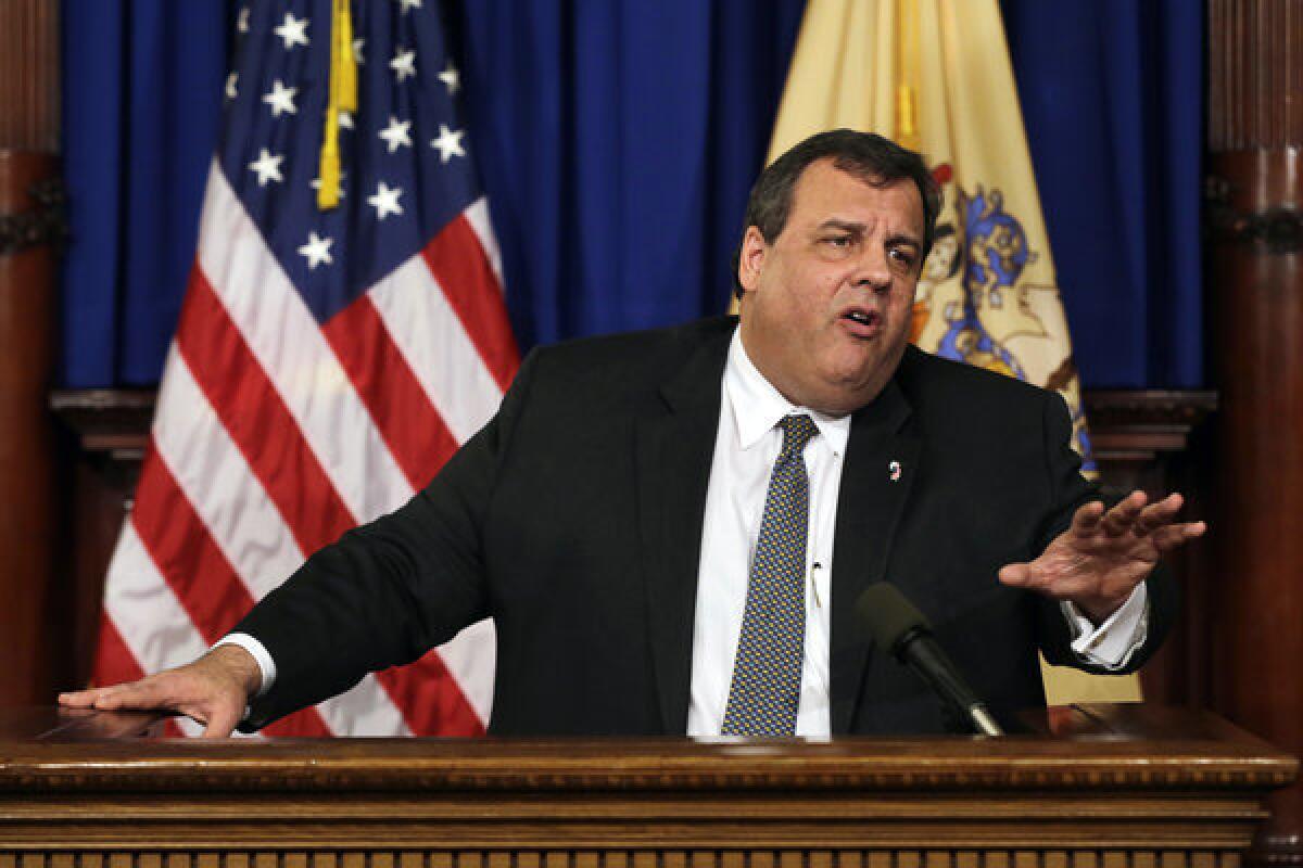 New Jersey Gov. Chris Christie speaks at a news conference in Trenton, N.J., on Thursday which he discussed gun control, including a new National Rifle Assn. television ad critical of President Obama.