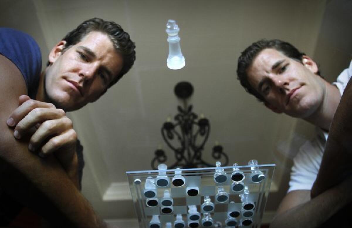 Tyler Winkelvoss, left, and Cameron Winklevoss, who have taken steps to allow investors to bet on Bitcoin's future.