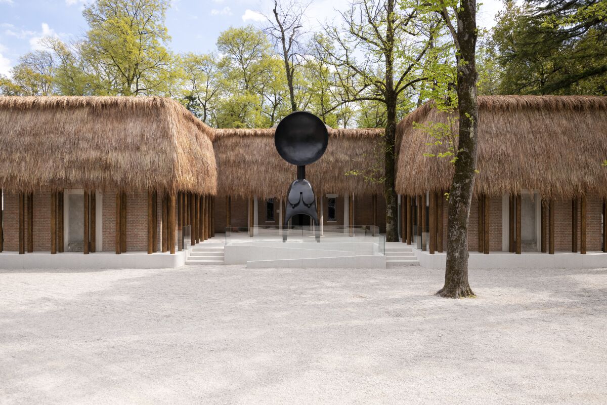 The Neoclassical U.S. Pavilion in Venice is wrapped in thatch — resembling African architecture.