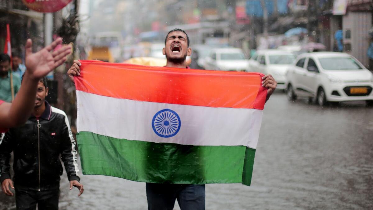 A man shouts patriotic slogans in Kolkata to celebrate the Indian air force's strike in Pakistan on Feb. 26.