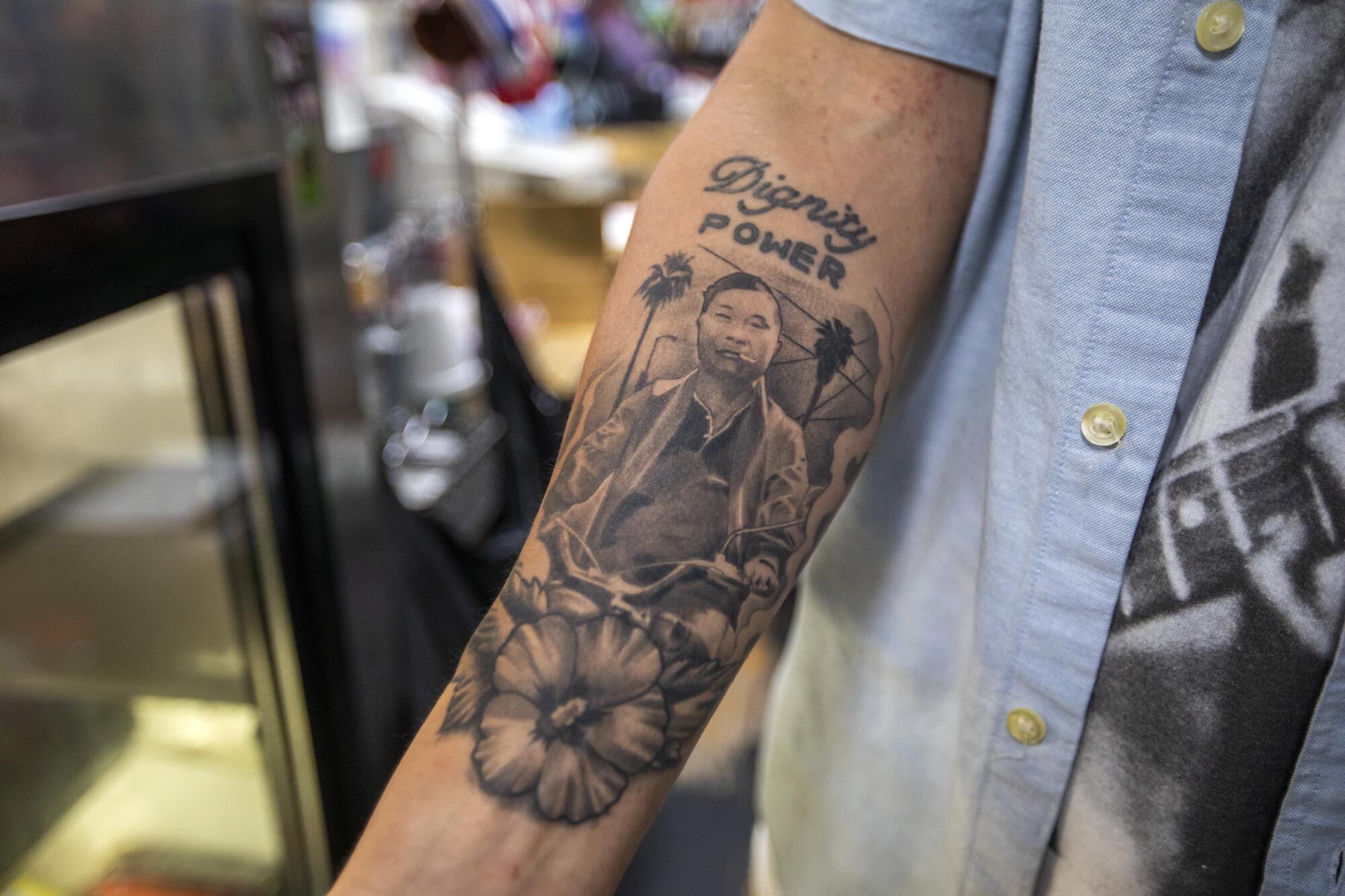 Danny Park, 38, has a tattoo of his grandfather on his right forearm. 