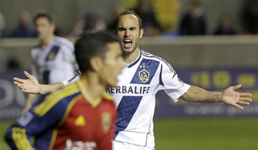 Landon Donovan shouts to a teammate during the Galaxy's overtime loss to Real Salt Lake, 2-0, in second leg of the MLS Western Conference semifinal Thursday. The Galaxy's elimination in the semifinal is the team's earliest exit from the playoffs since 2008.