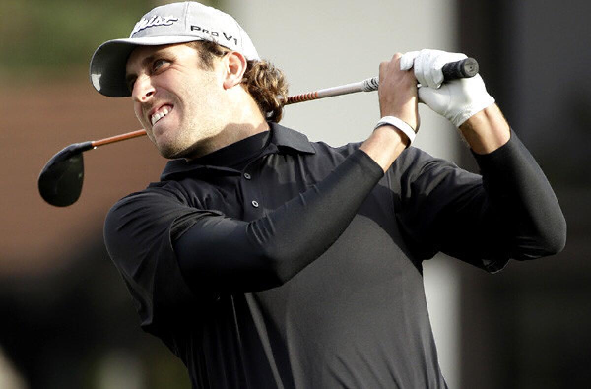 Andrew Loupe watches his drive at No. 15 on the Monterey Peninsula Country Club Shore Course during the first round of the AT&T Pebble Beach National Pro-Am on Thursday.