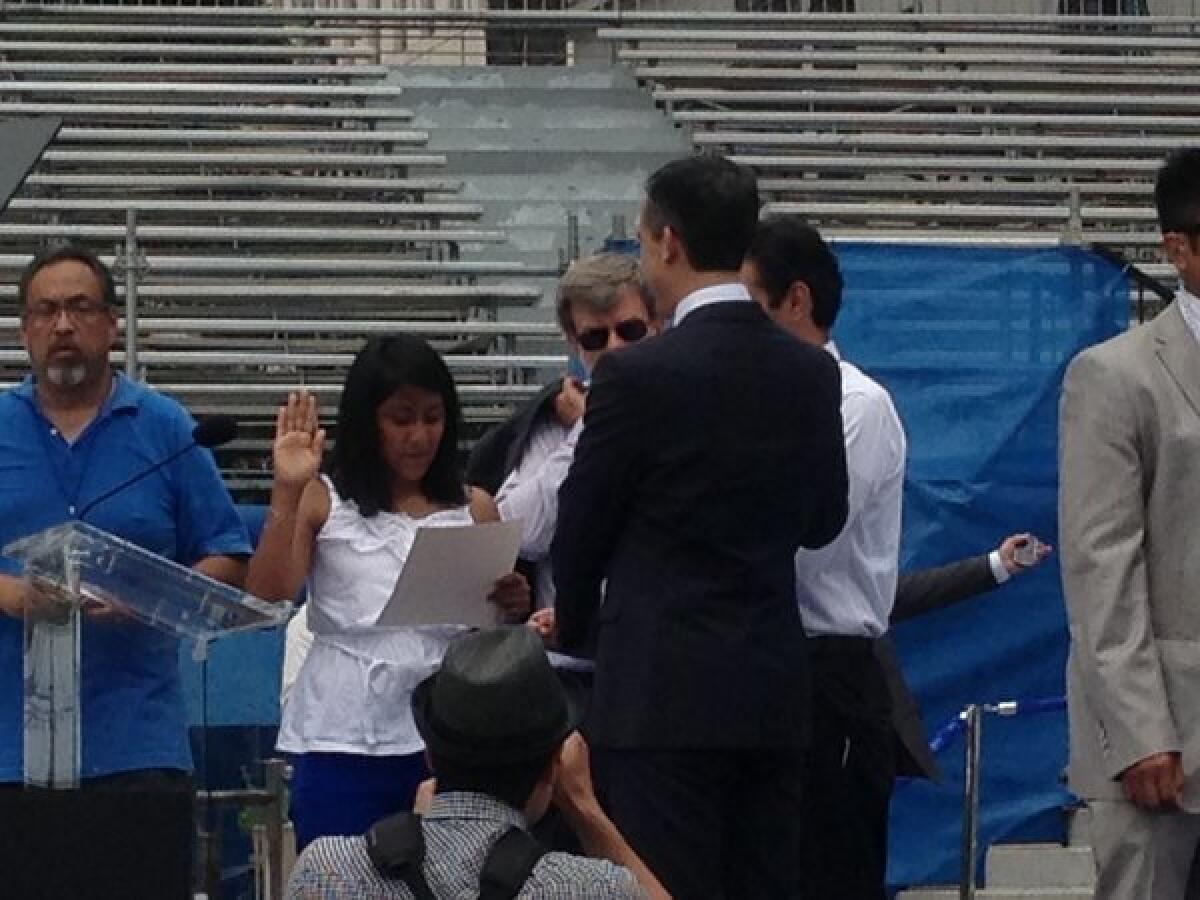 Kenia Castillo, an eighth-grader at Luther Burbank Magnet Middle School, practices the oath she will administer to Mayor-elect Eric Garcetti.