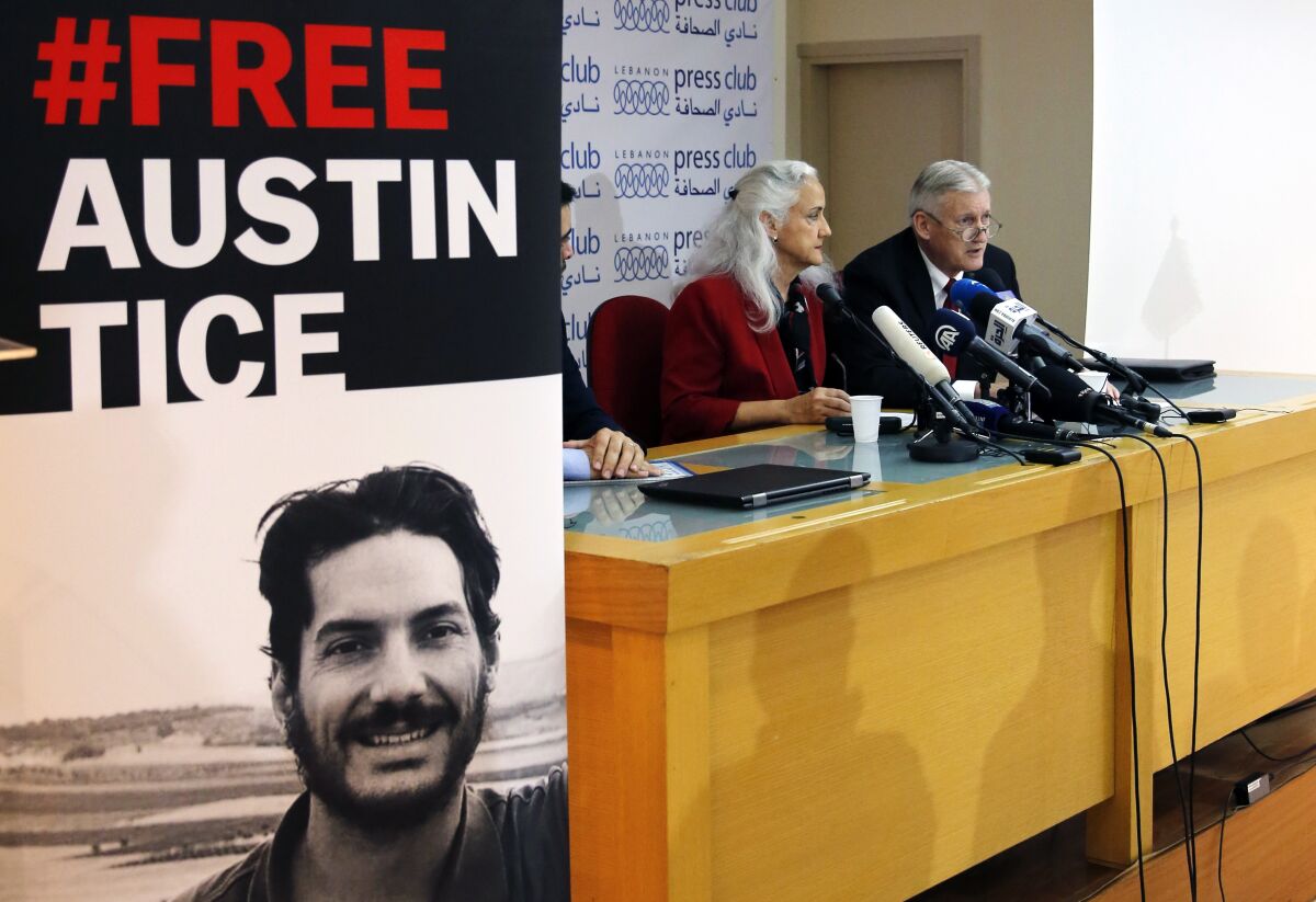FILE - Marc and Debra Tice, the parents of Austin Tice, who is missing in Syria for nearly six years, speak during a press conference, at the Press Club, in Beirut, Lebanon, Dec. 4, 2018. President Joe Biden says he's meeting with the parents of American journalist Austin Tice, who went missing in Syria 10 years ago. The meeting with Marc and Debra Tice is expected to take place at the White House. Debra Tice was introduced Saturday night as being in attendance at the White House Correspondents’ Association Dinner. (AP Photo/Bilal Hussein, File)