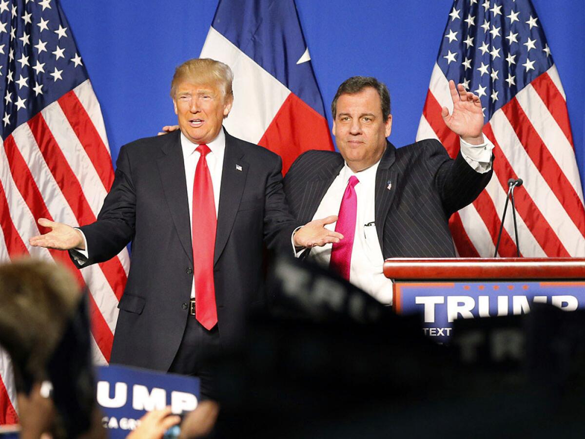 New Jersey Gov. Chris Christie, right, introduces Republican presidential candidate Donald J. Trump after endorsing him before a rally at the Fort Worth Convention Center in Texas on Friday.