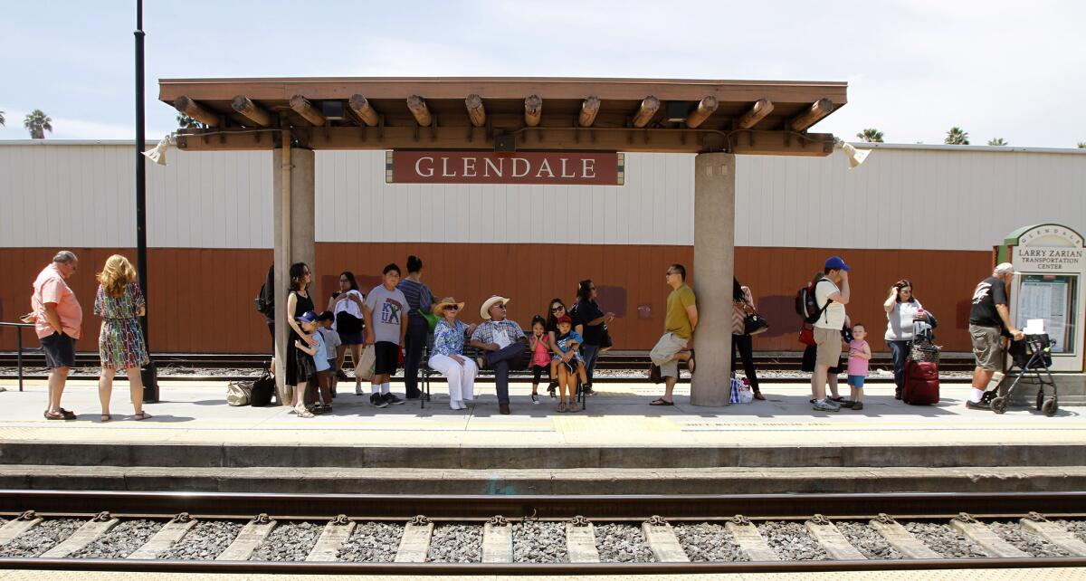 People wait for a free ride on Metrolink from the Glendale Station to downtown L.A. as part of the Los Angeles Union Station's 75th anniversary, on Saturday, May 3, 2014. Passengers received free rides back and forth to downtown Glendale and Downtown L.A.