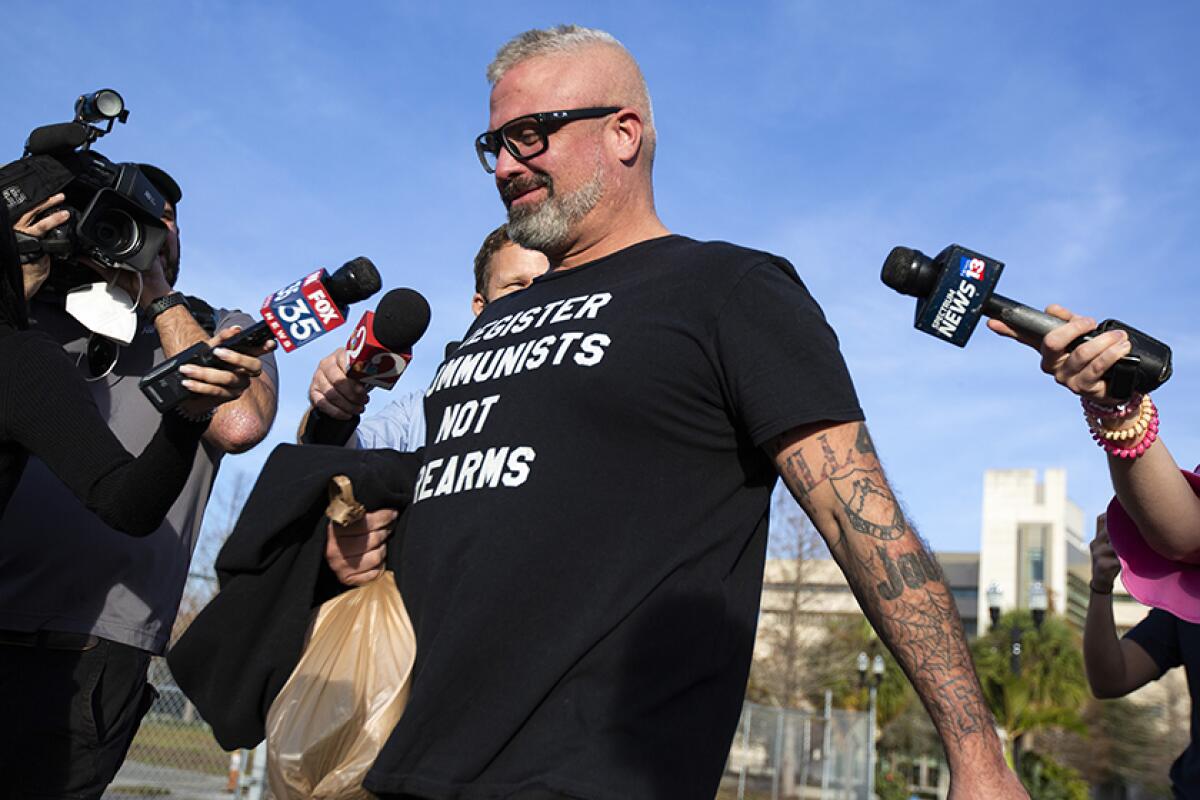 Proud Boys organizer Joseph Biggs, 37, leaves a courthouse in Orlando, Fla., after a hearing Wednesday.