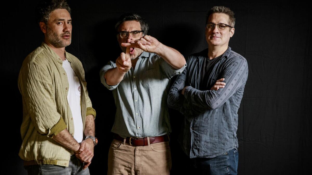 Taika Waititi, left, Jemaine Clement and Paul Simms are executive producers of FX's new vampire comedy series, "What We Do in the Shadows."