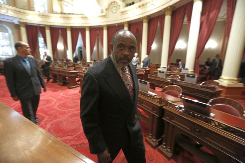 State Sen. Roderick Wright (D-Inglewood), leaving the Senate chambers at the Capitol earlier this month, is on a leave of absence.