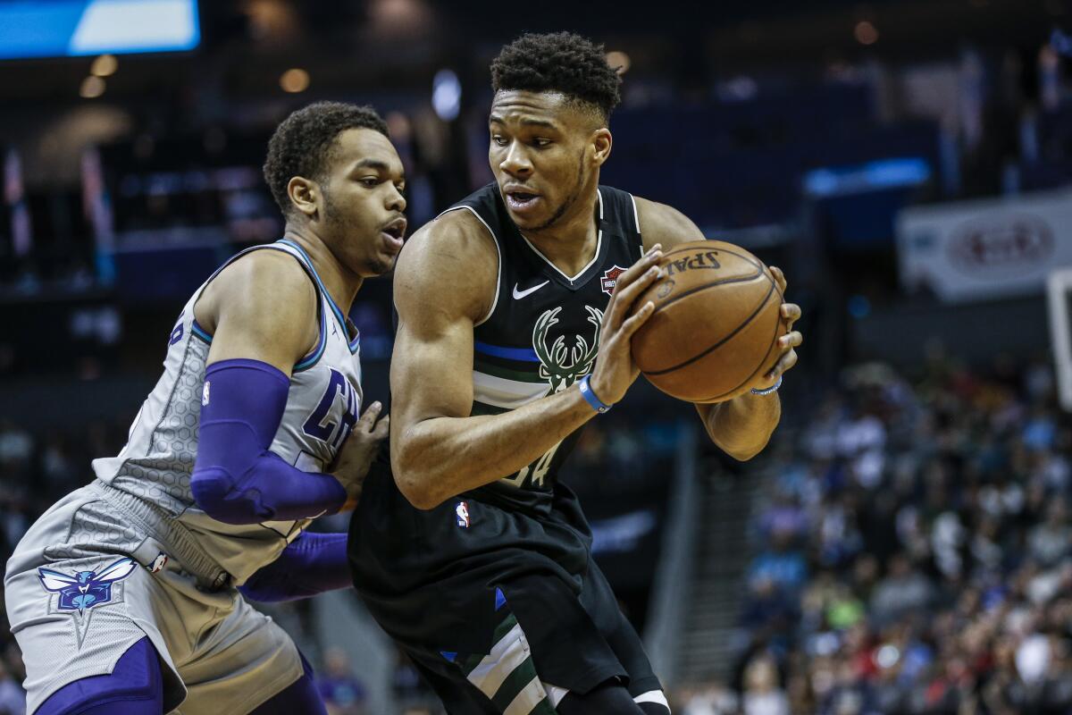 De'Aaron Fox of Team LeBron drives to the basket during the NBA