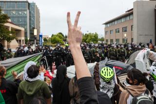 Irvine, CA, Wednesday, May 15, 2024 - Scores of law enforcement personnel from various agencies gather at UC Irvine to displace hundreds of demonstrating students, faculty and supporters protesting the treatment of Palestinians and the UC system's investments in Isreali interests. (Robert Gauthier/Los Angeles Times)