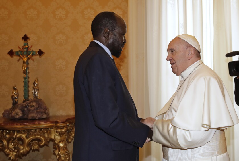 FILE - In this March 16, 2019 file photo, South Sudan President Salva Kiir Mayardit meets Pope Francis during their private audience at the Vatican. Pope Francis and the Archbishop of Canterbury marked the 10th anniversary of the independence of South Sudan on Friday, July 9, 2021, by urging its rival political leaders to make the necessary personal sacrifices to consolidate peace. (AP Photo/Alessandra Tarantino, Pool, file)