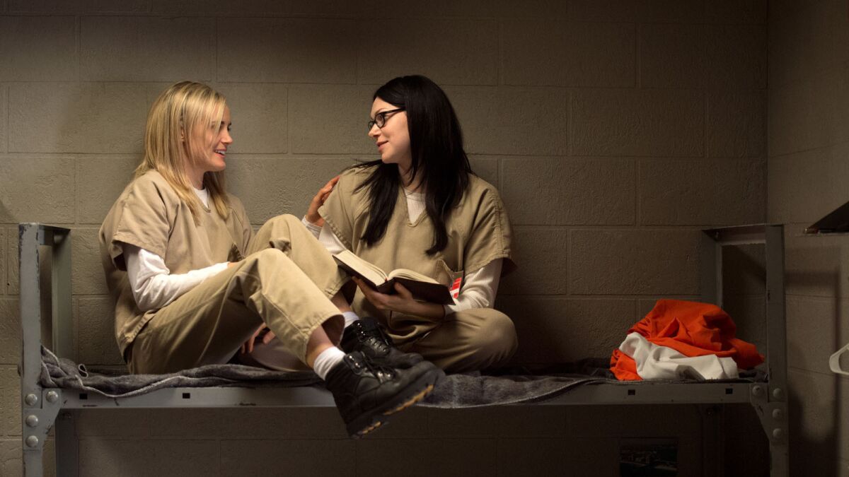 The average time adults spend watching live TV each day has continued to decline. Here, a scene from Netflix's "Orange Is the New Black."
